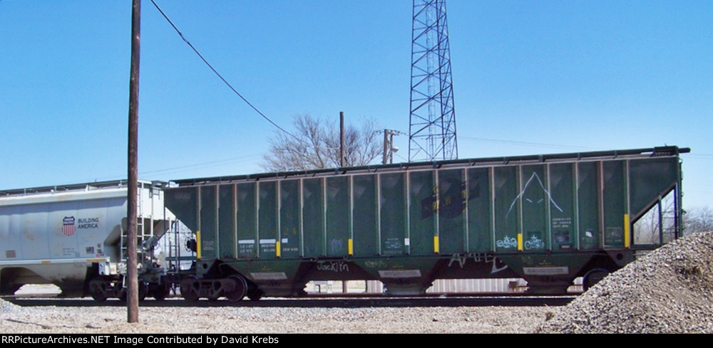 Another faded out CNW covered hopper.